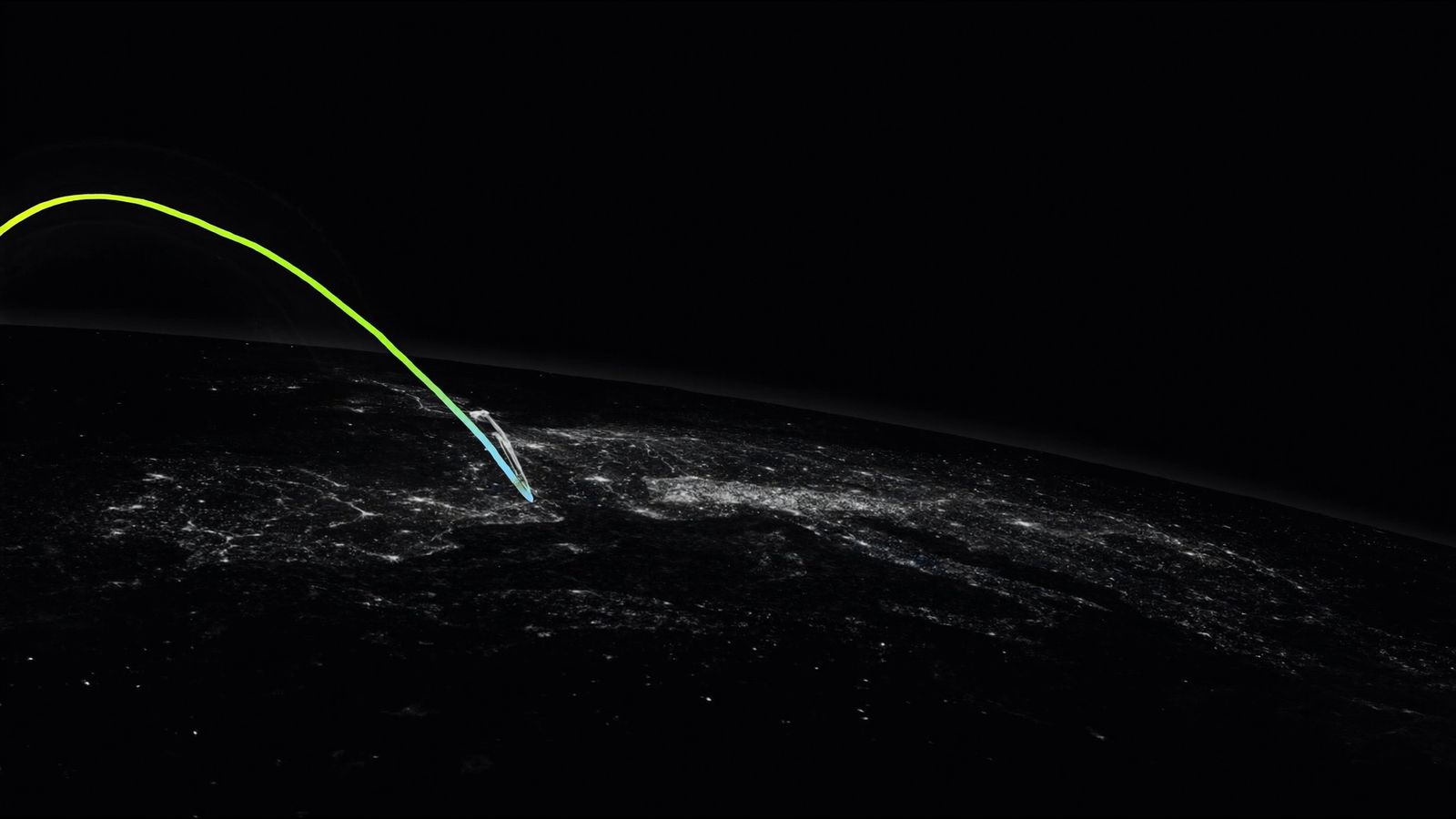 Europe at night seen from orbit with the Benelux coast at centre, a single chartreuse arc tracing a satellite pass above Brussels