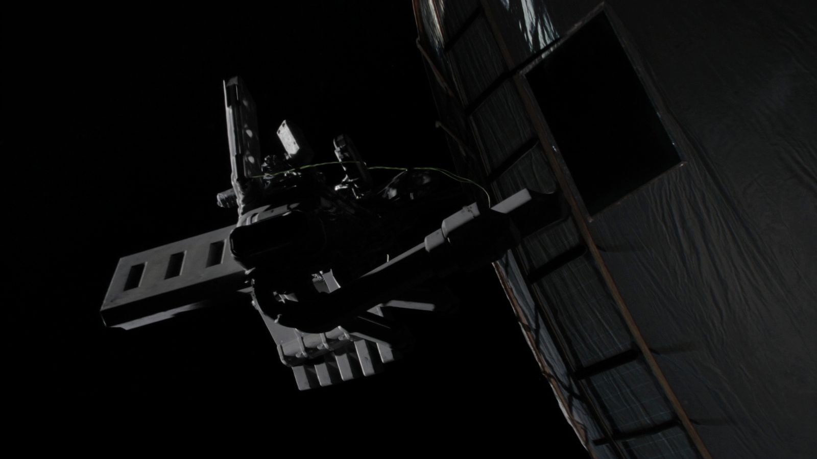 A robotic servicing vehicle holding station off a large GEO satellite with a small propulsion pod in its arm, a single chartreuse line tracing the pod's path to the client