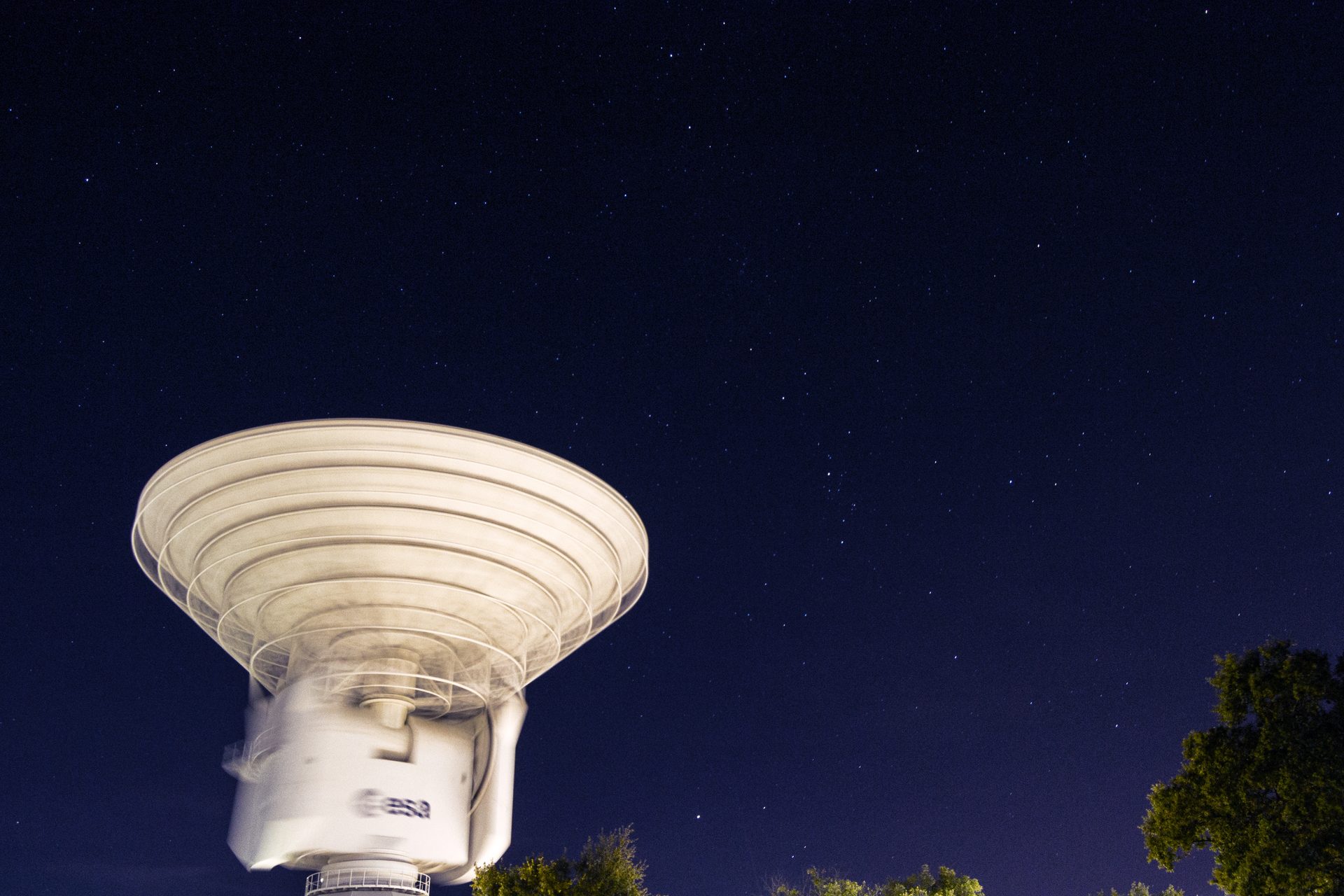 ESA Cebreros 35-metre deep-space tracking antenna at twilight — a Telemetry, Tracking and Command facility