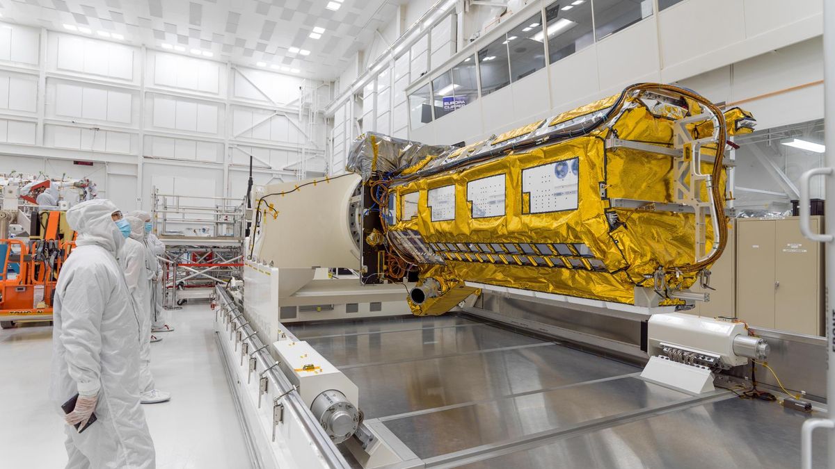 Gold-blanketed synthetic aperture radar payload in a clean room